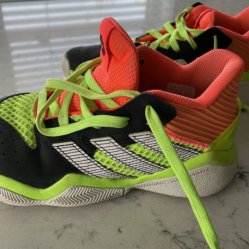 Girls basketball sneakers. Fluorescent orange and yellow. Girls size 4
